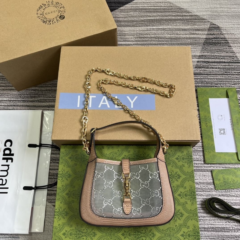 G*u*i top handle bags